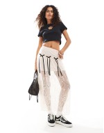 cropped baby tee with flower cut out in black