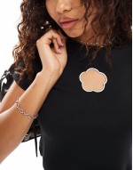 cropped baby tee with flower cut out in black