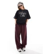 x Felicia Wedin Apres Ski oversized embroidered apres ski logo t-shirt in black
