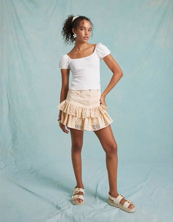 broderie hem contrast denim mini skirt in ecru